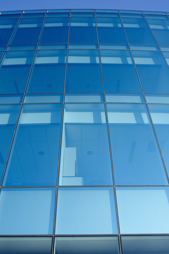 Service Federal Credit Union Corporate Office, Kawneer North America, Clearwall™ Curtain Wall, 190 Narrow Stile Entrances, 350 Medium Stile Entrances, 500 Wide Stile Entrances (custom Stainless Steel clad). 1600 SS (Screw Spline) Curtain Wall, GLASSvent™ for Curtain Wall (with Power operators), automatic window operators