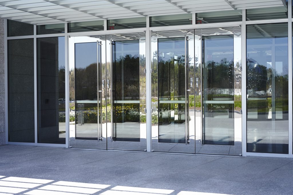 Service Federal Credit Union Corporate Office, Kawneer North America, Clearwall™ Curtain Wall, 190 Narrow Stile Entrances, 350 Medium Stile Entrances, 500 Wide Stile Entrances (custom Stainless Steel clad). 1600 SS (Screw Spline) Curtain Wall, GLASSvent™ for Curtain Wall (with Power operators), automatic window operators