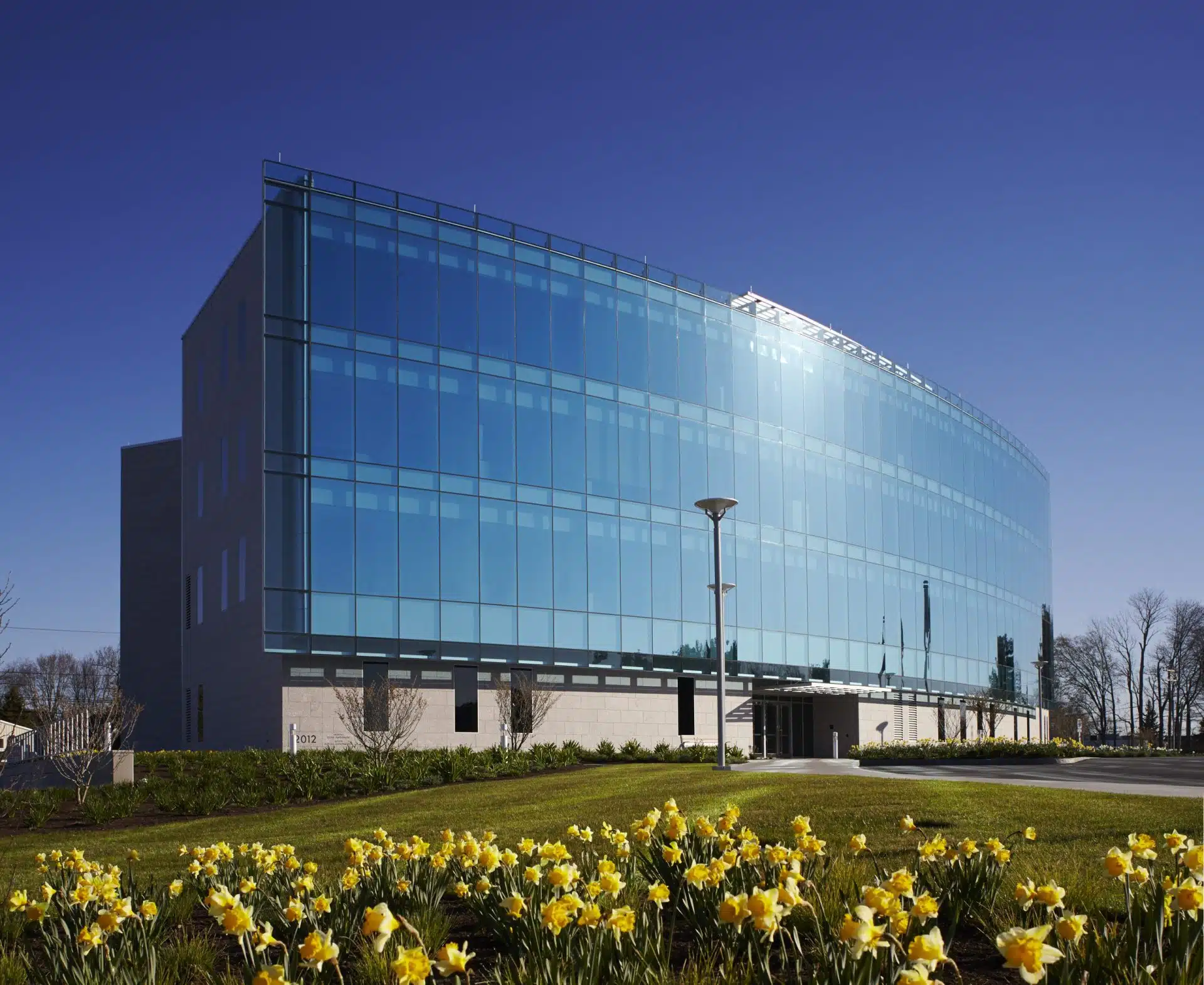 Service Federal Credit Union Corporate Office, Kawneer North America, Clearwall™ Curtain Wall, 190 Narrow Stile Entrances, 350 Medium Stile Entrances, 500 Wide Stile Entrances (custom Stainless Steel clad). 1600 SS (Screw Spline) Curtain Wall, GLASSvent™ for Curtain Wall (with Power operators), automatic window operators