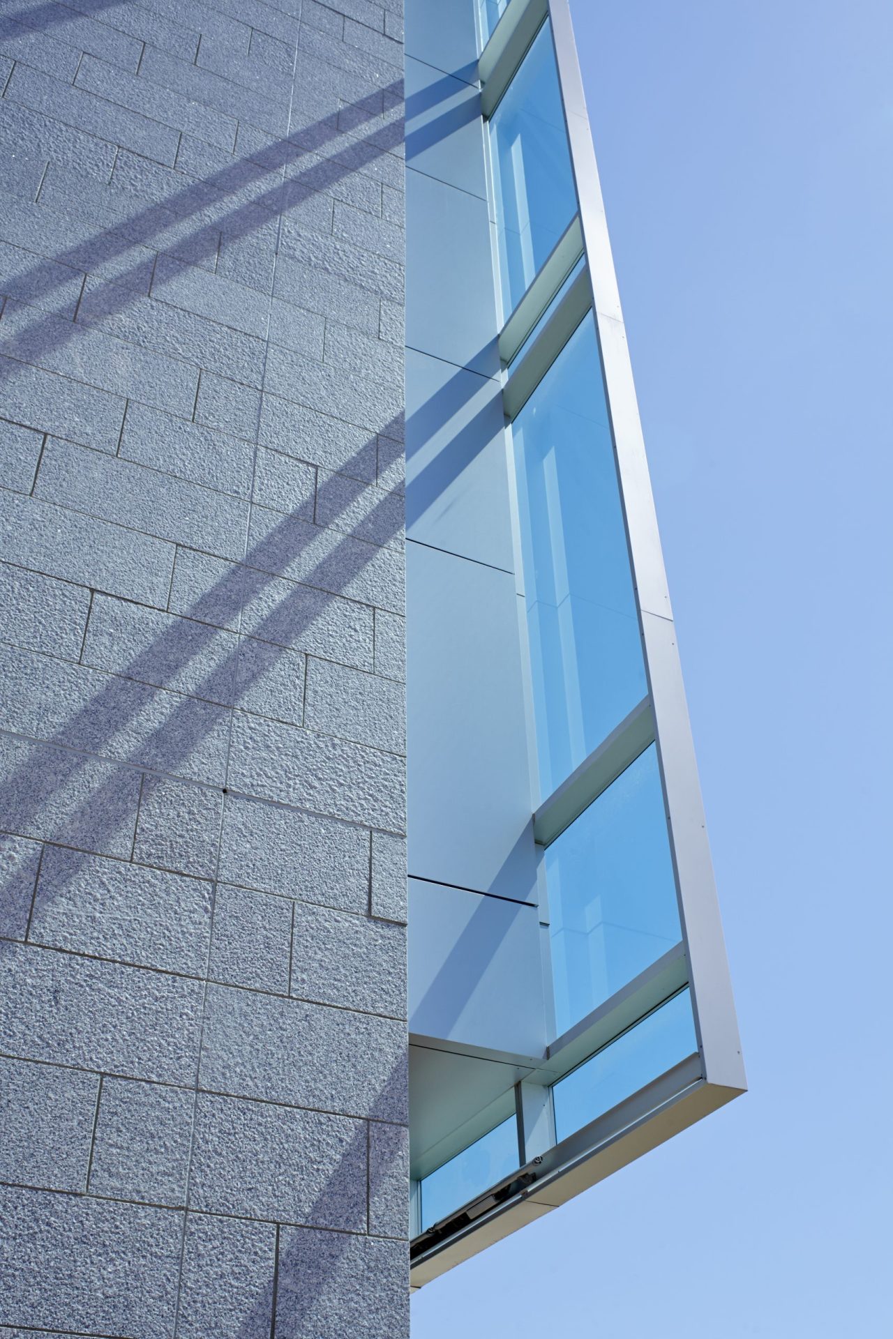 Service Federal Credit Union Corporate Office, Kawneer North America, Clearwall™ Curtain Wall, 190 Narrow Stile Entrances, 350 Medium Stile Entrances, 500 Wide Stile Entrances (custom Stainless Steel clad). 1600 SS (Screw Spline) Curtain Wall, GLASSvent™ for Curtain Wall (with Power operators), automatic window operators