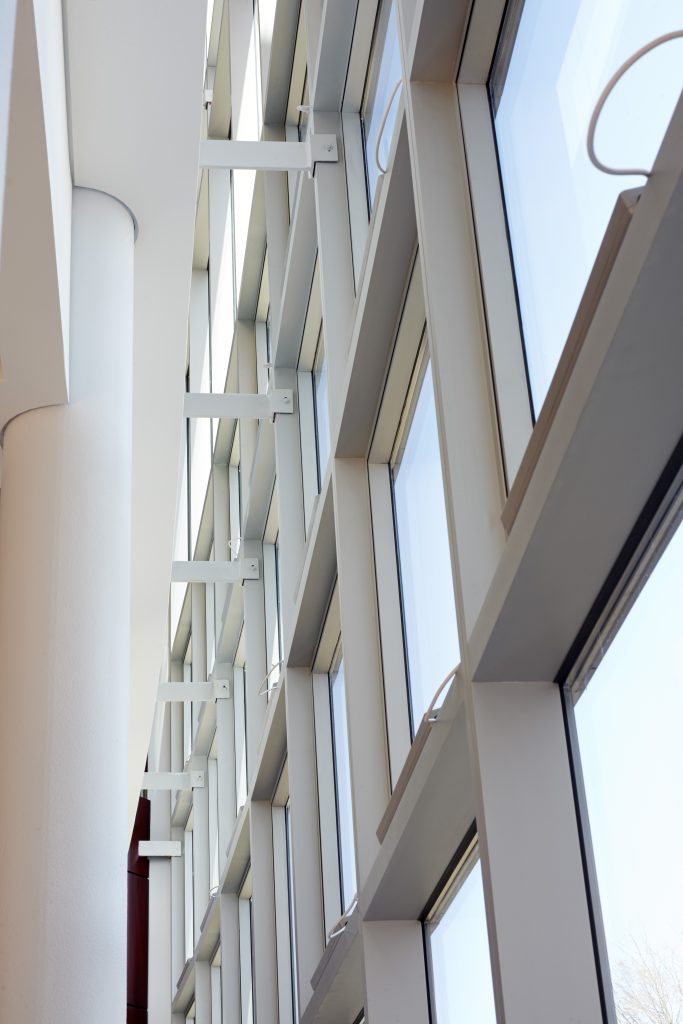 Service Federal Credit Union Corporate Office, Kawneer North America, Clearwall™ Curtain Wall, 190 Narrow Stile Entrances, 350 Medium Stile Entrances, 500 Wide Stile Entrances (custom Stainless Steel clad). 1600 SS (Screw Spline) Curtain Wall, GLASSvent™ for Curtain Wall (with Power operators), automatic window operators