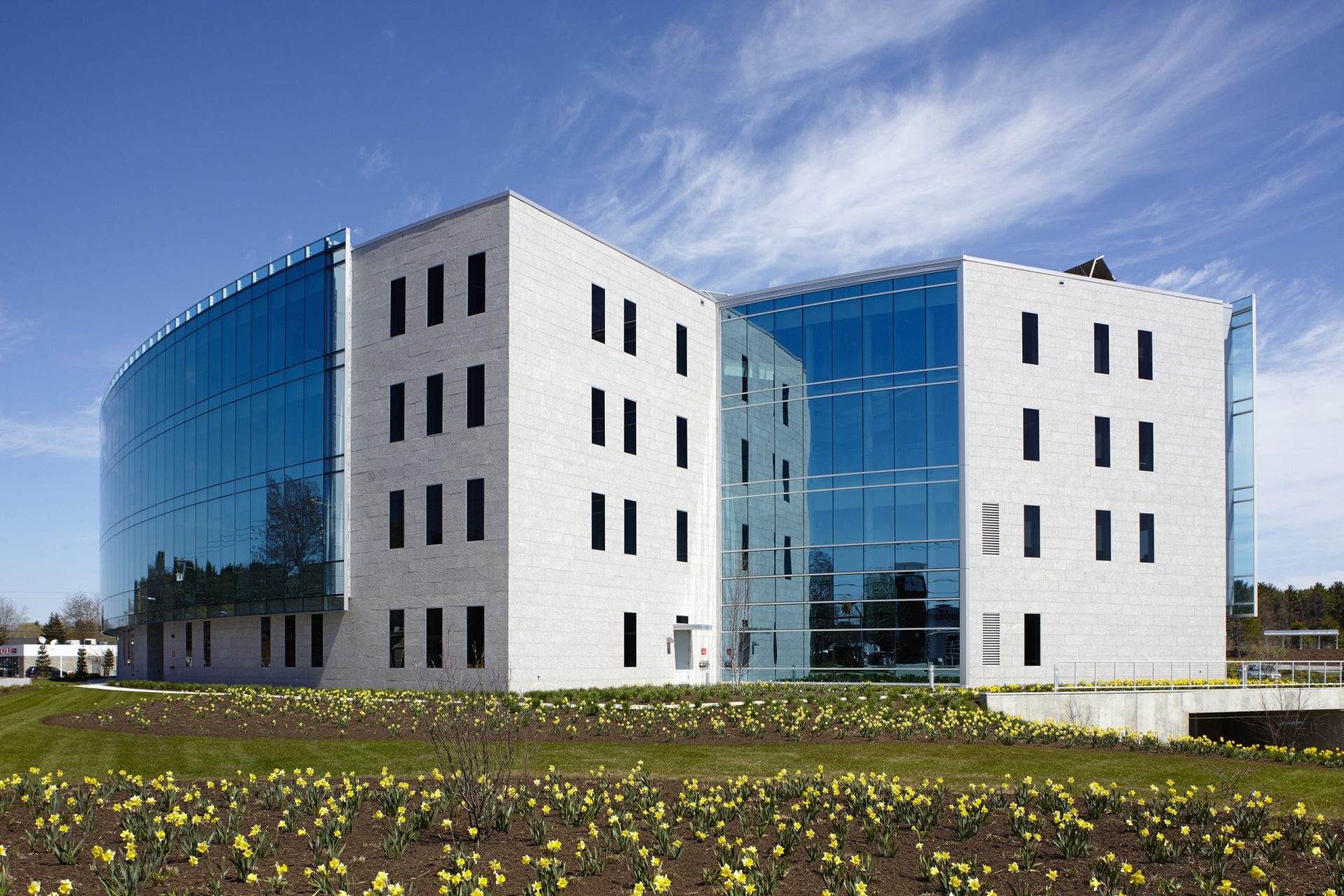 Service Federal Credit Union Corporate Office, Kawneer North America, Clearwall™ Curtain Wall, 190 Narrow Stile Entrances, 350 Medium Stile Entrances, 500 Wide Stile Entrances (custom Stainless Steel clad). 1600 SS (Screw Spline) Curtain Wall, GLASSvent™ for Curtain Wall (with Power operators), automatic window operators